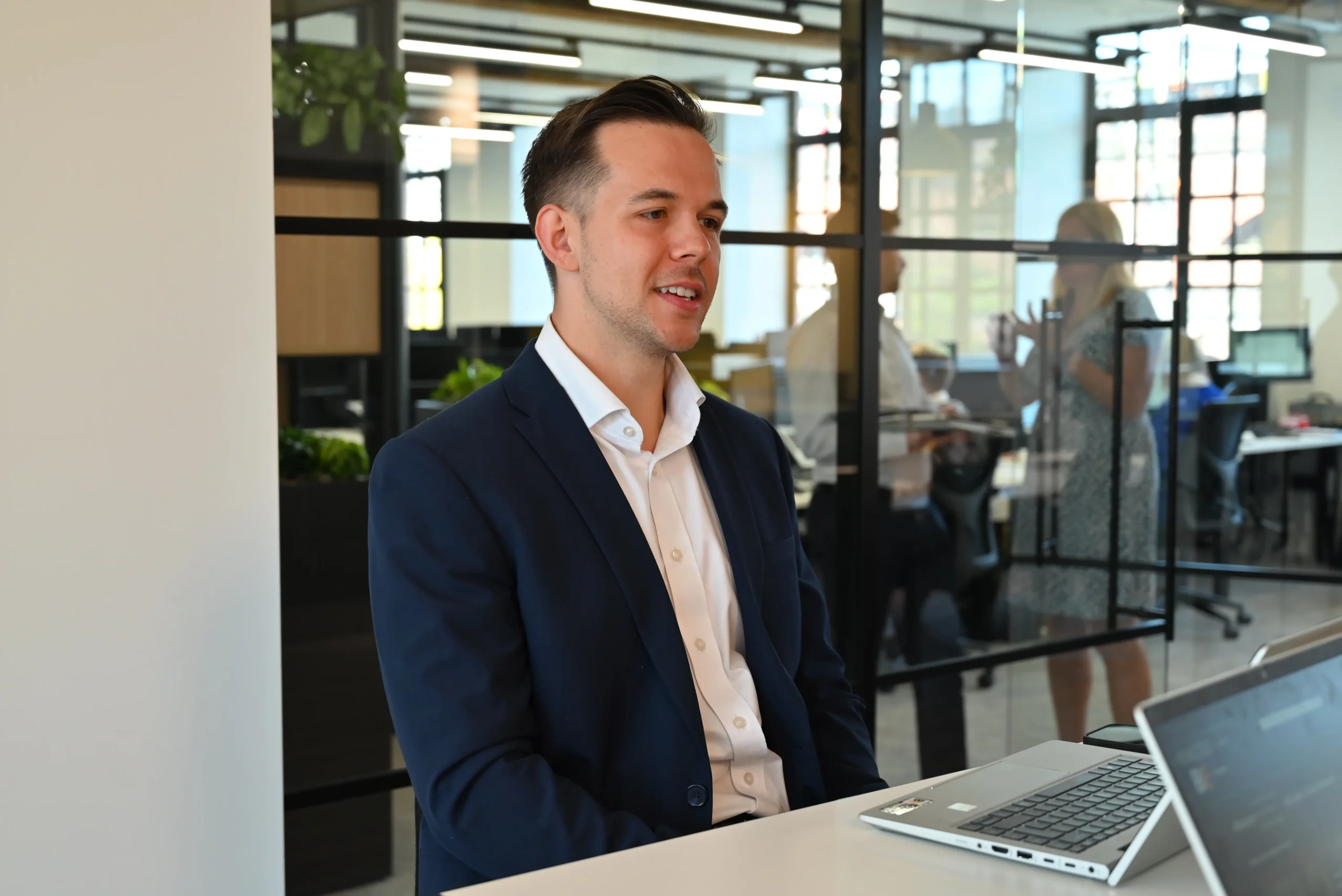 Russell Kaminski having a conversation with someone off screen.